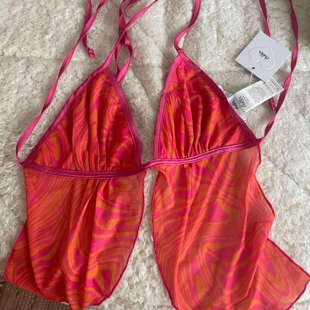 Very cute pink tie up blousy top! Never worn!